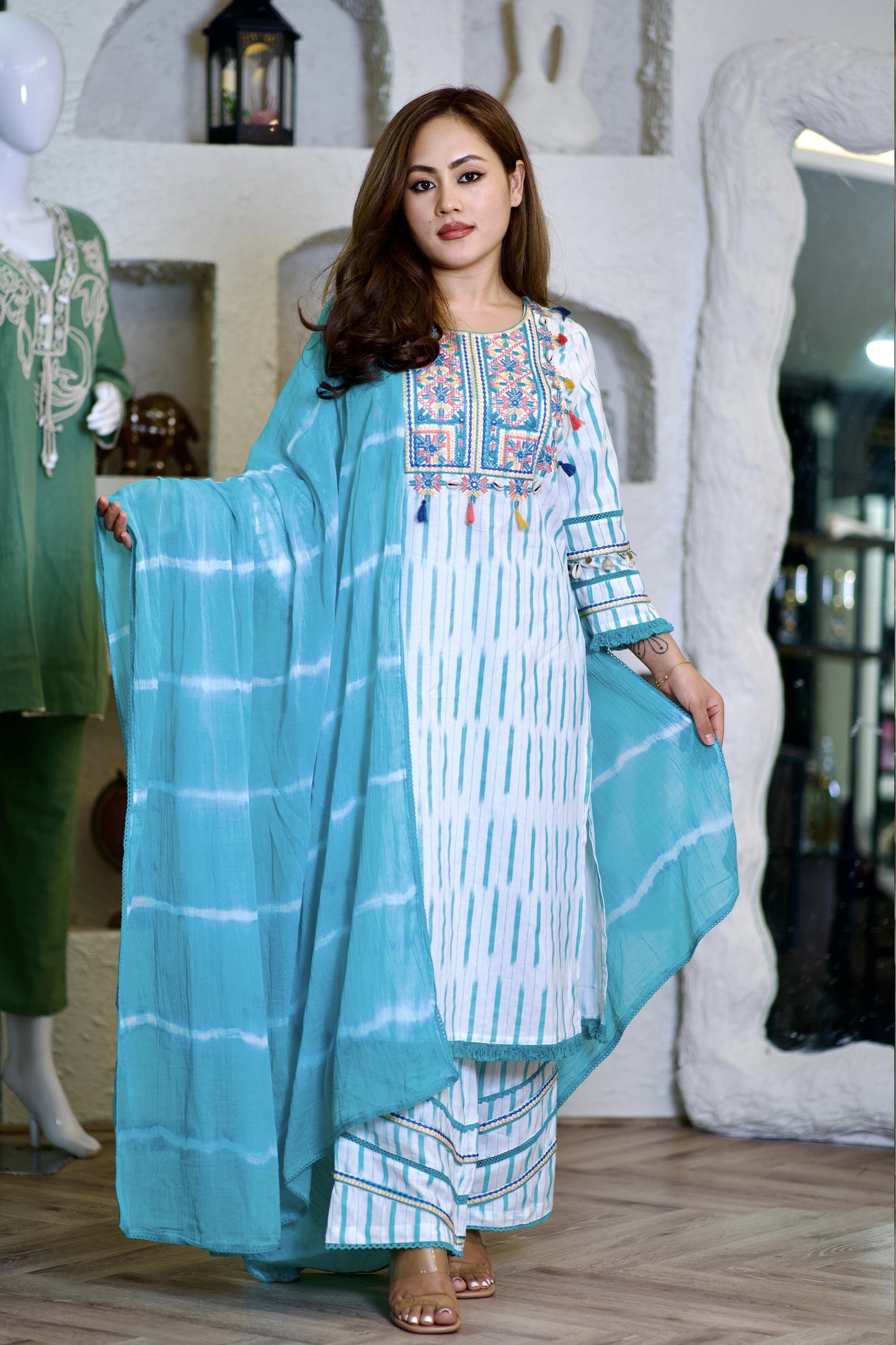 Lily turquoise and white suit with seashells