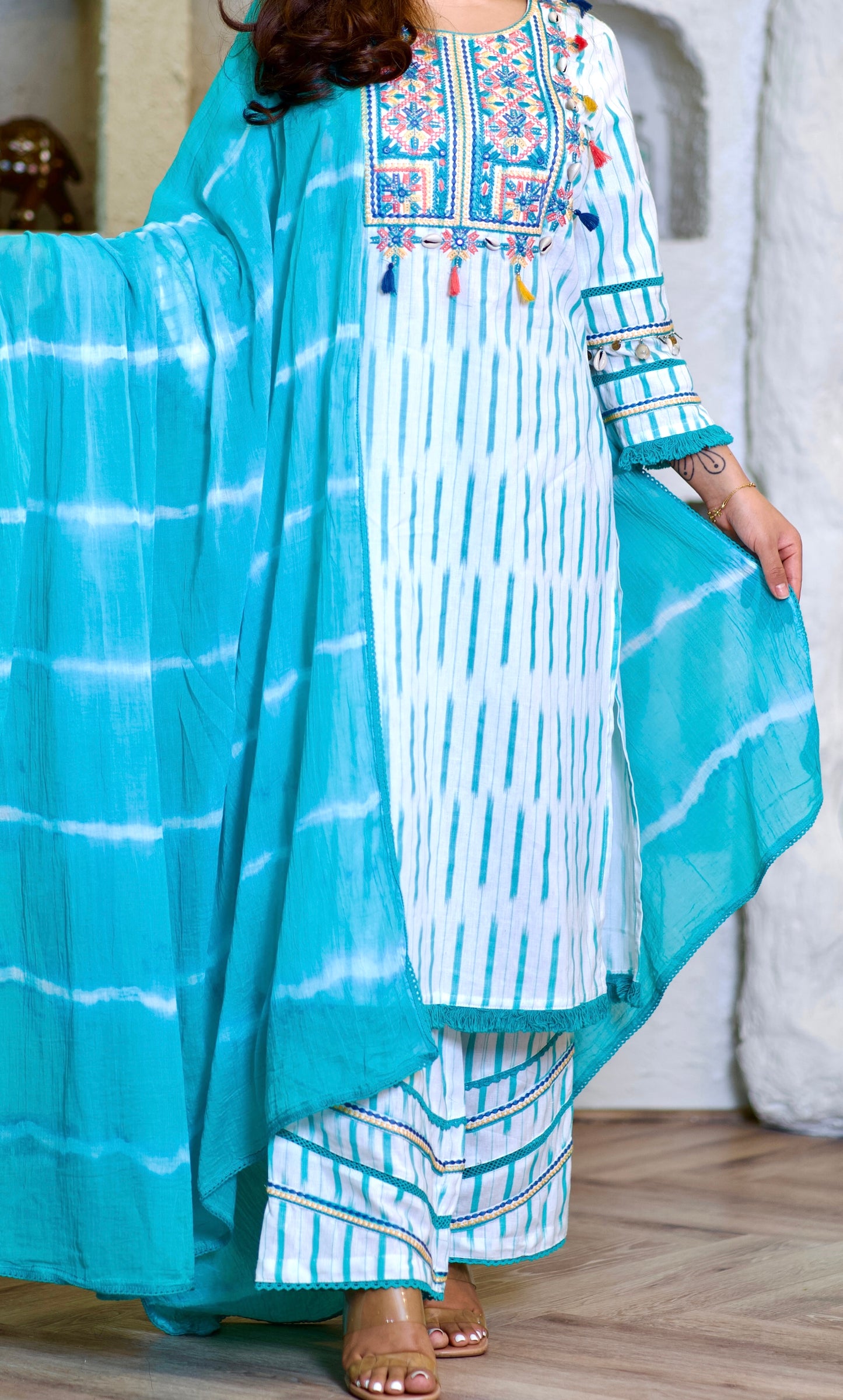 Lily turquoise and white suit with seashells