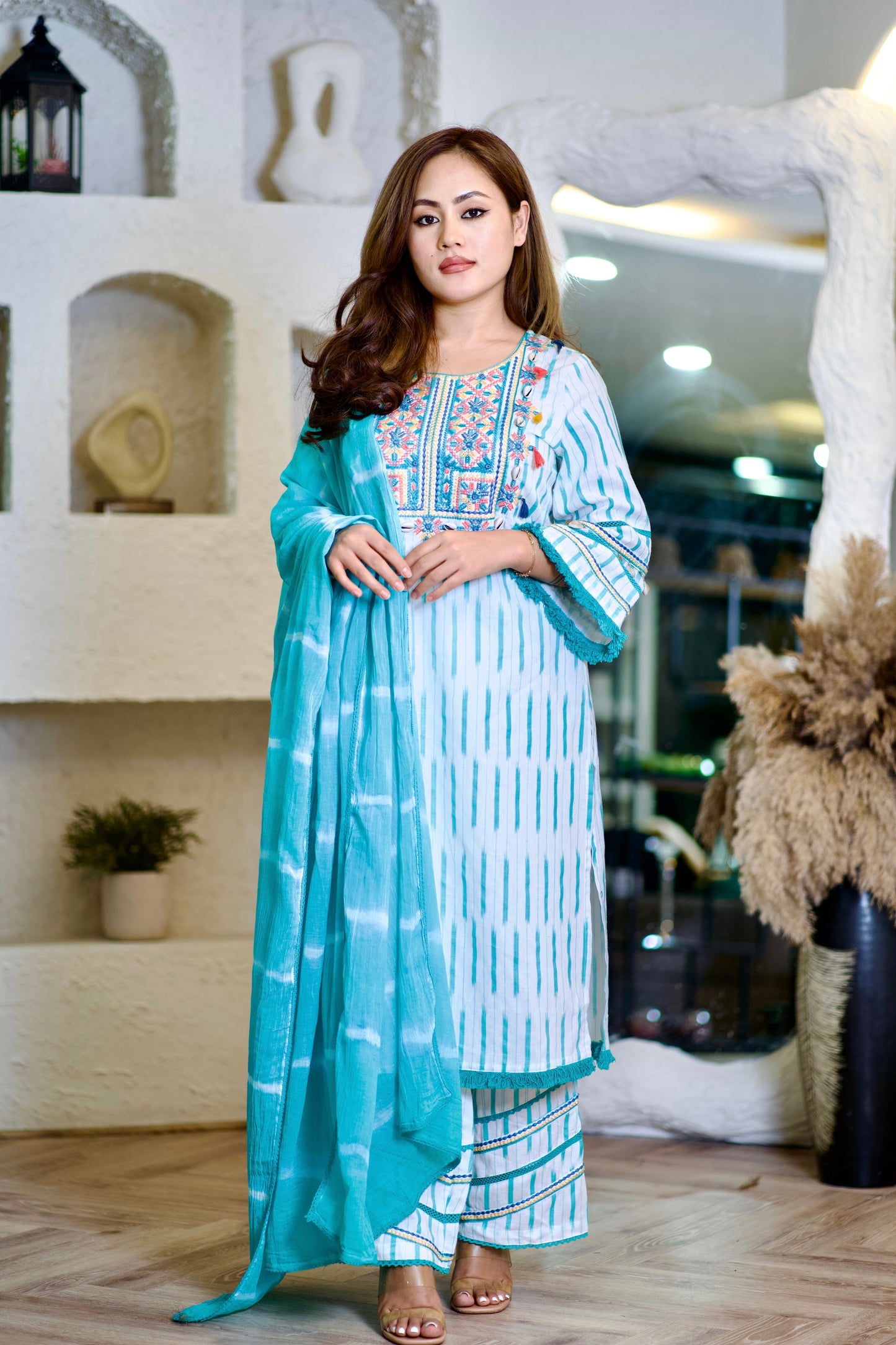 Lily turquoise and white suit with seashells